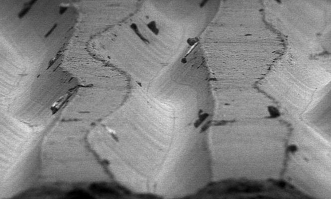 incredible-photos-of-record-grooves-under-an-electron-microscope